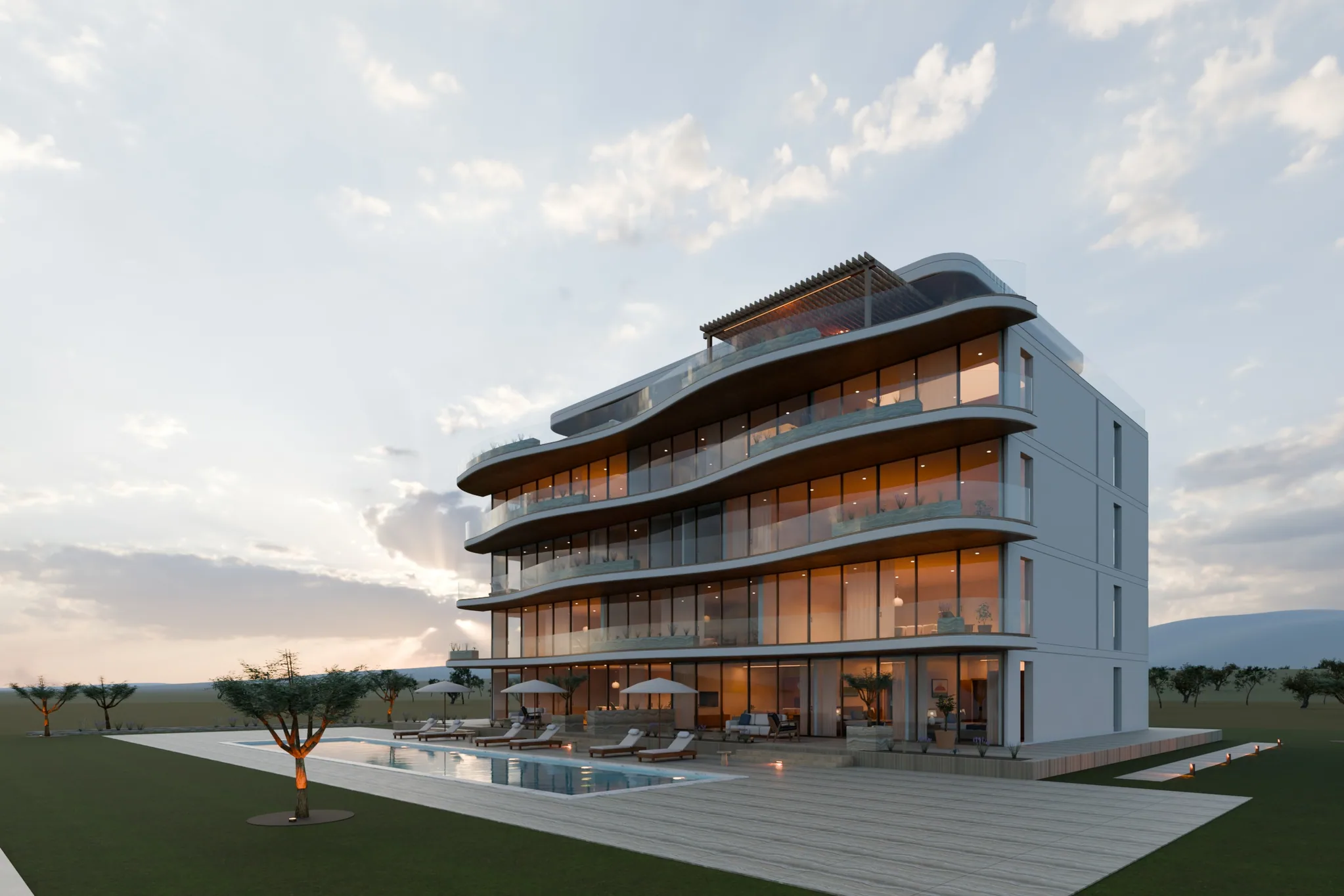 Rendu photoréaliste du projet de démonstration KYMA au crépuscule, avec des balcons arrondis, des logements éclairés et une piscine